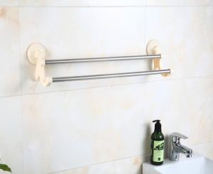 What’s the difference between a single pole or a double pole for a punch-free towel rack