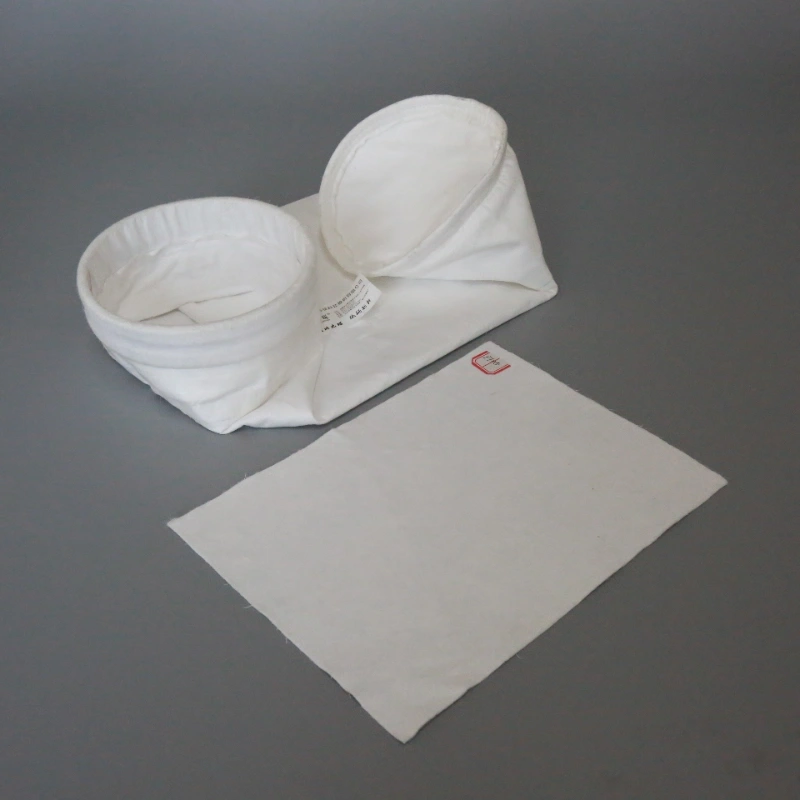 picture of PTFE needle punched fabric and PTFE dust filter bag.